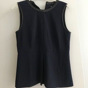 Sleeveless, peplum top